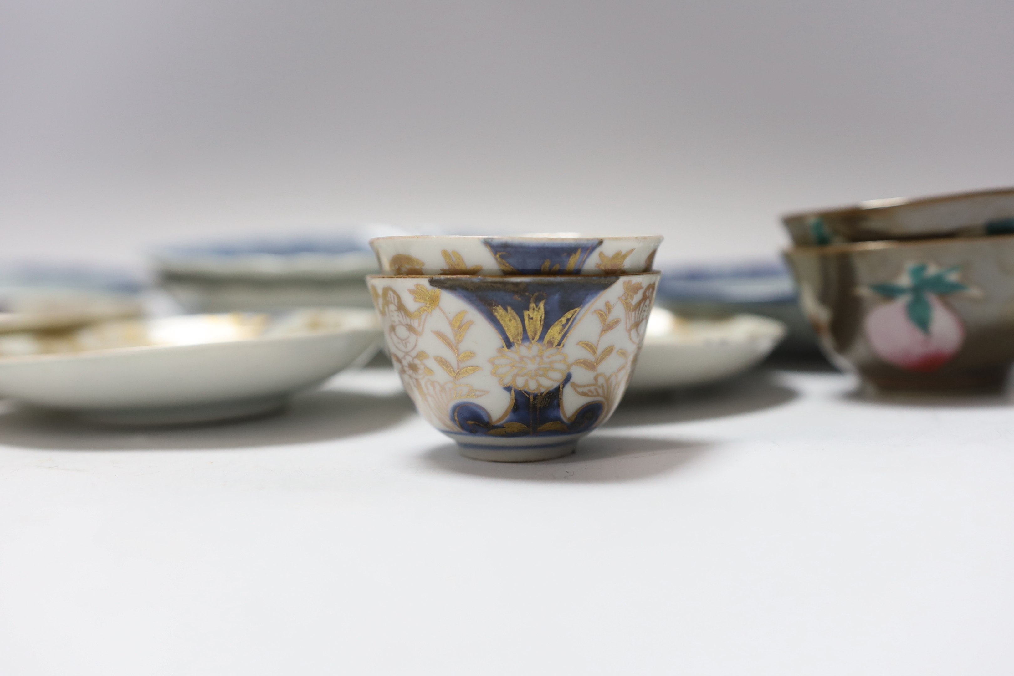 Four 18th century Japanese teabowls with three matching saucers, two 19th century Chinese cafe au lait glazed teabowls and four Chinese blue and white small dishes